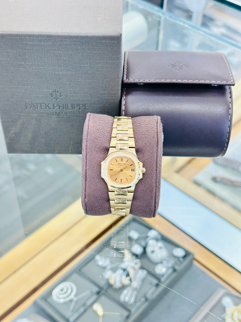 Patek Philippe Nautilus 4700/1j  Ladies 26 Champagne PreOwned - Diamonds East Intl.