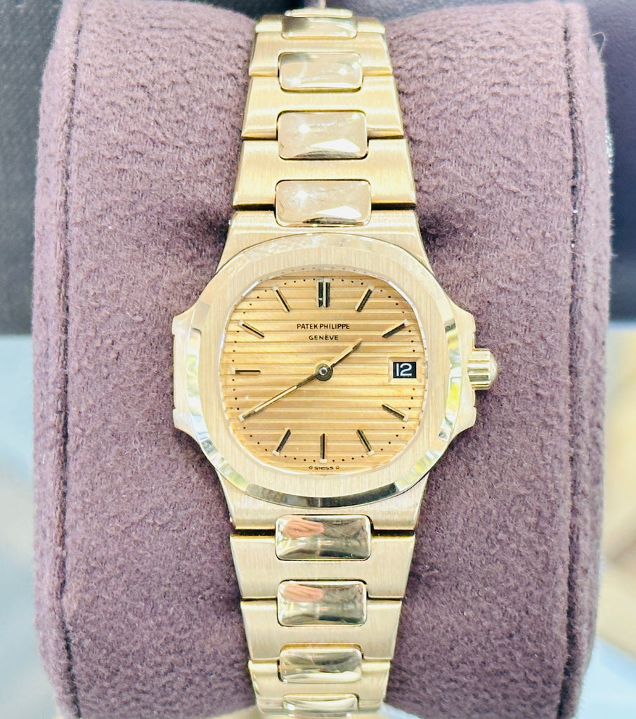 Patek Philippe Nautilus 4700/1j  Ladies 26 Champagne PreOwned - Diamonds East Intl.