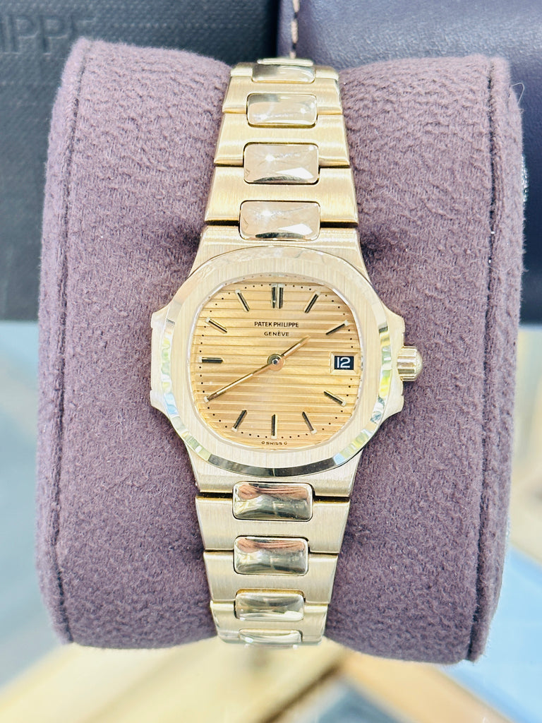 Patek Philippe Nautilus 4700/1j  Ladies 26 Champagne PreOwned - Diamonds East Intl.