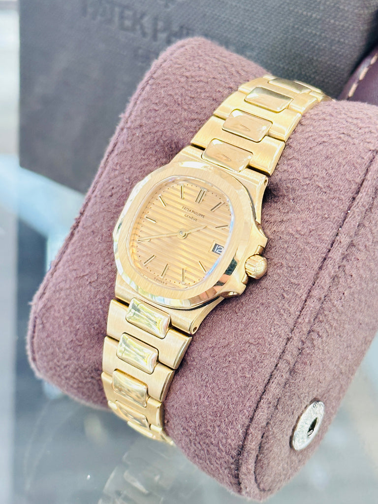 Patek Philippe Nautilus 4700/1j  Ladies 26 Champagne PreOwned - Diamonds East Intl.