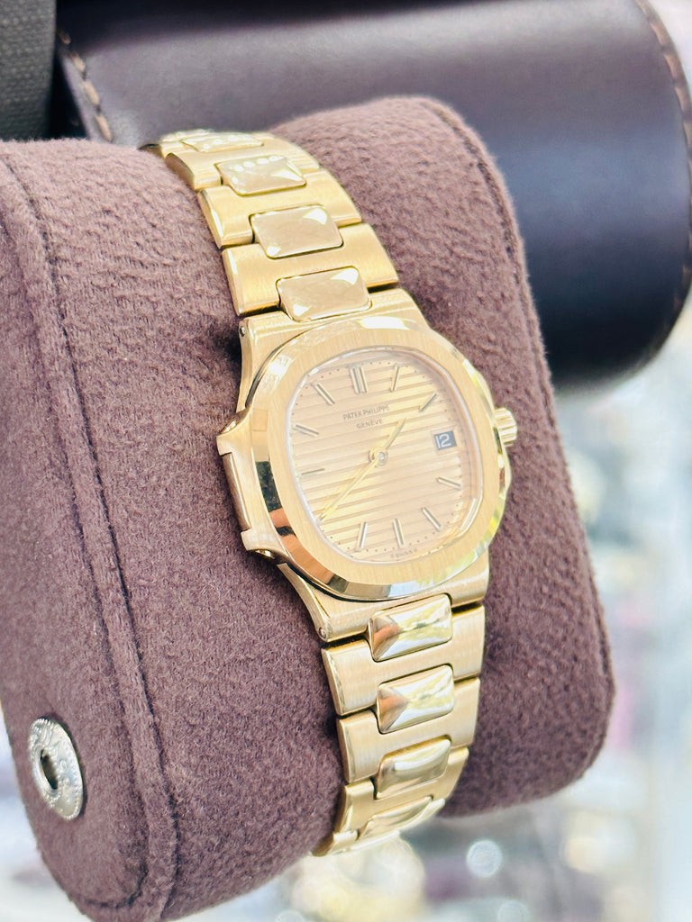 Patek Philippe Nautilus 4700/1j  Ladies 26 Champagne PreOwned - Diamonds East Intl.