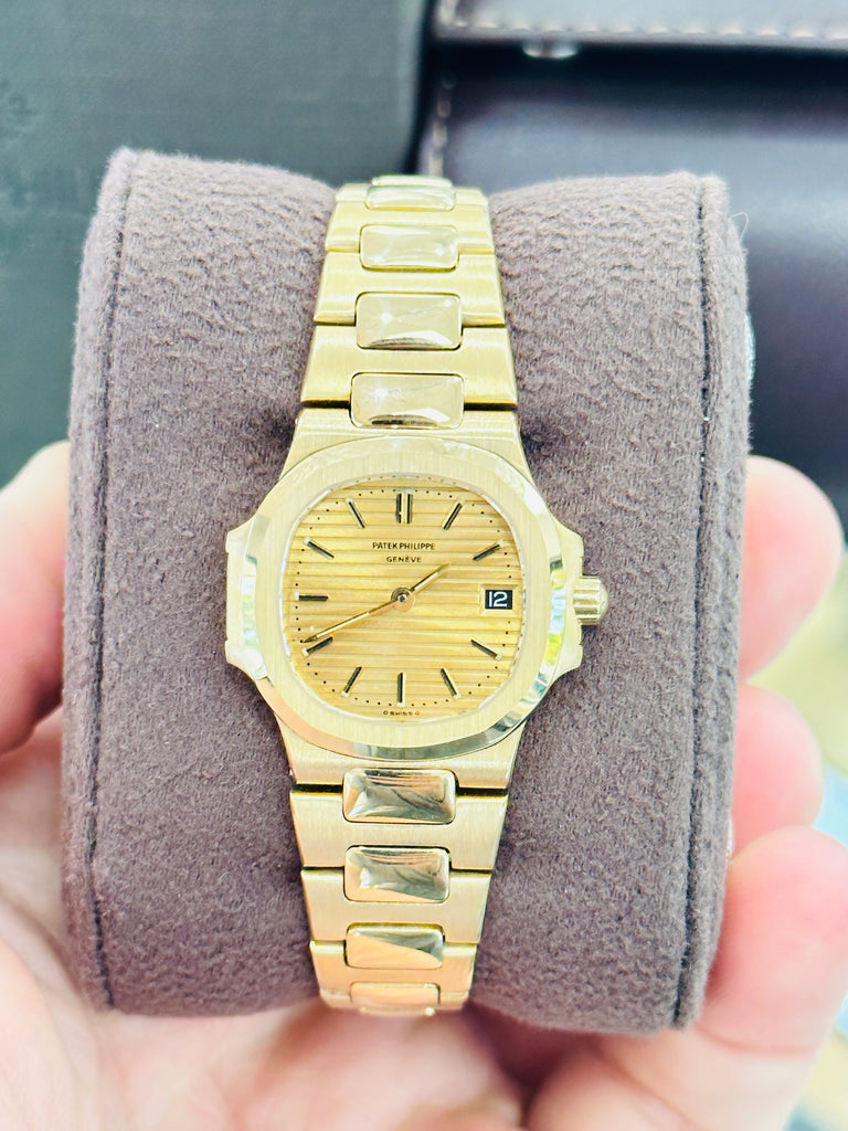 Patek Philippe Nautilus 4700/1j  Ladies 26 Champagne PreOwned - Diamonds East Intl.