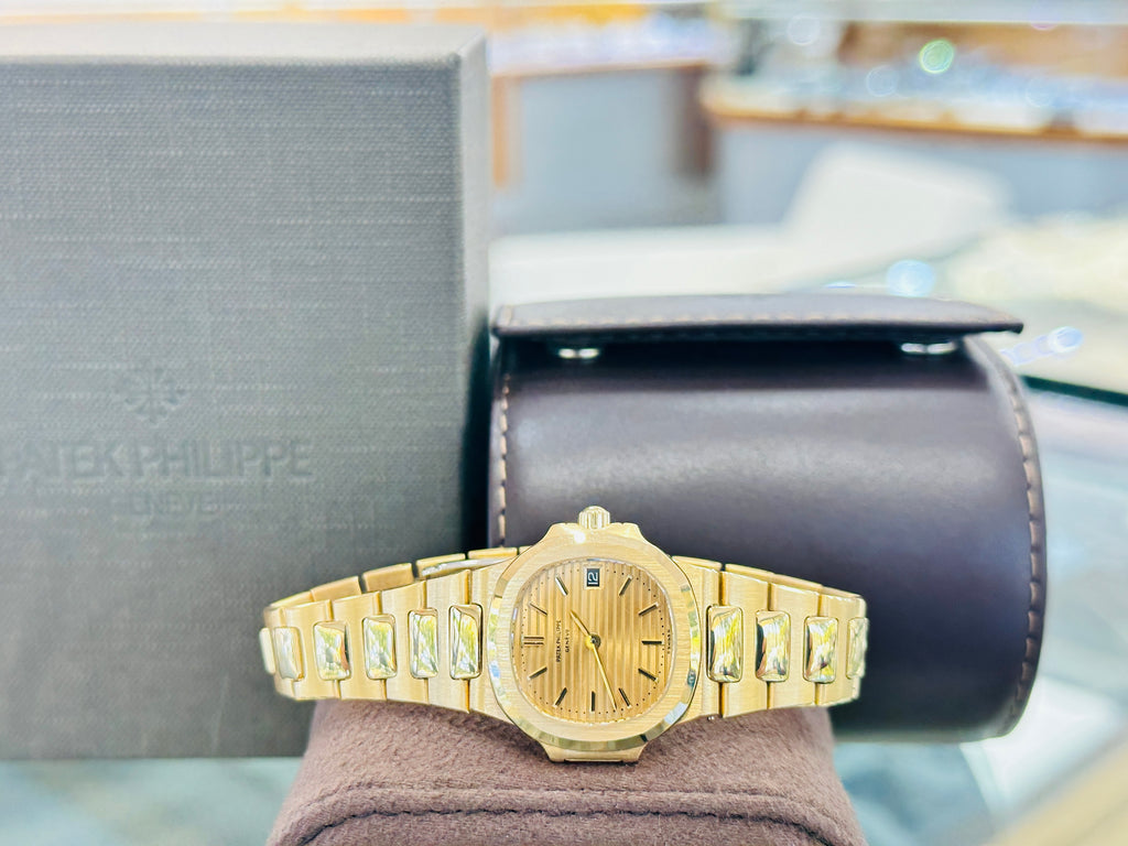 Patek Philippe Nautilus 4700/1j  Ladies 26 Champagne PreOwned - Diamonds East Intl.