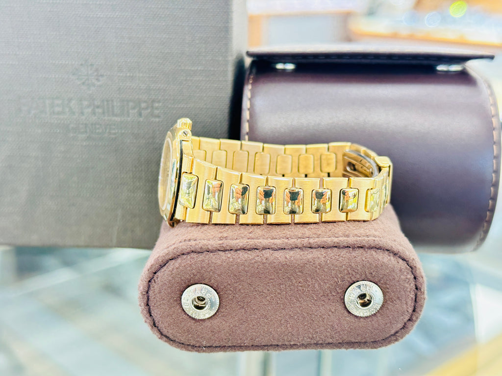 Patek Philippe Nautilus 4700/1j  Ladies 26 Champagne PreOwned - Diamonds East Intl.