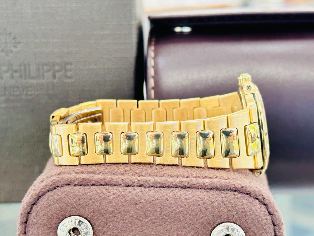 Patek Philippe Nautilus 4700/1j  Ladies 26 Champagne PreOwned - Diamonds East Intl.