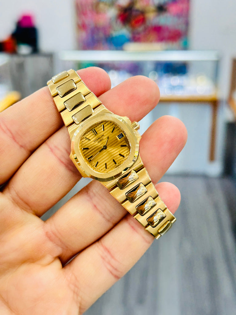 Patek Philippe Nautilus 4700/1j  Ladies 26 Champagne PreOwned - Diamonds East Intl.