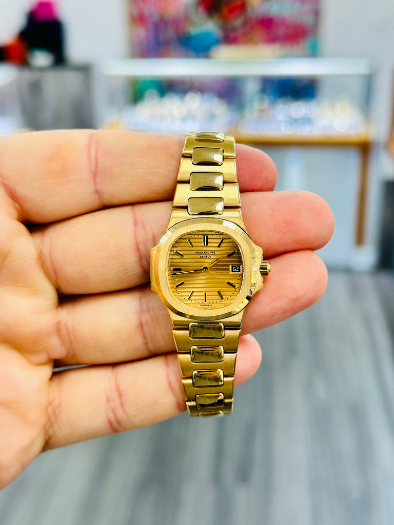 Patek Philippe Nautilus 4700/1j  Ladies 26 Champagne PreOwned - Diamonds East Intl.