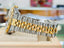 Rolex Datejust 36 116233 18K Yellow Gold / SS Champagne Roman Dial Fluted Bezel Jubilee MINT - Diamonds East Intl.