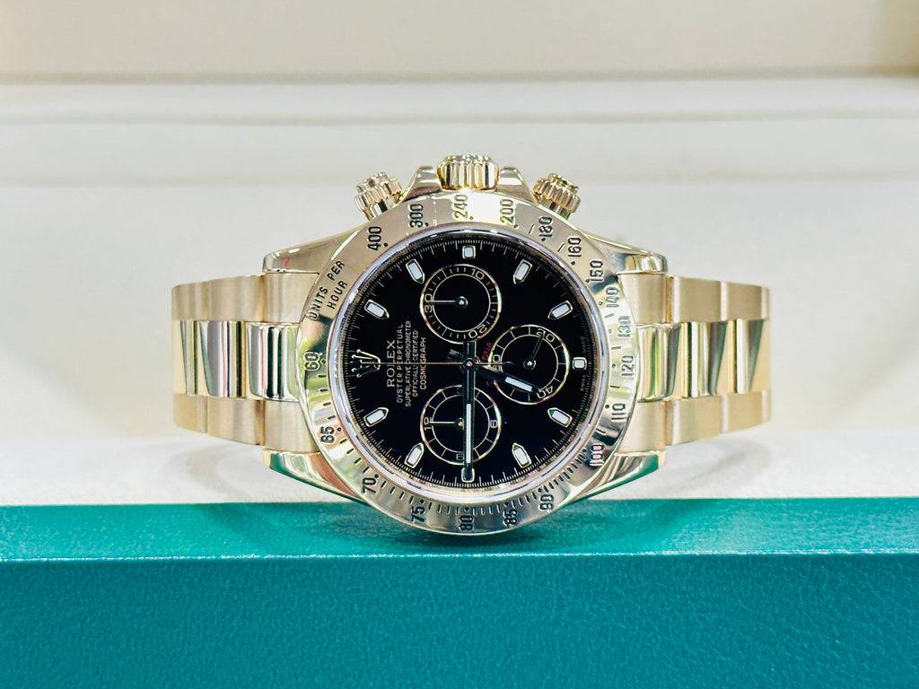 Rolex Daytona 116528 Black Dial Yellow Gold PreOwned Box - Diamonds East Intl.