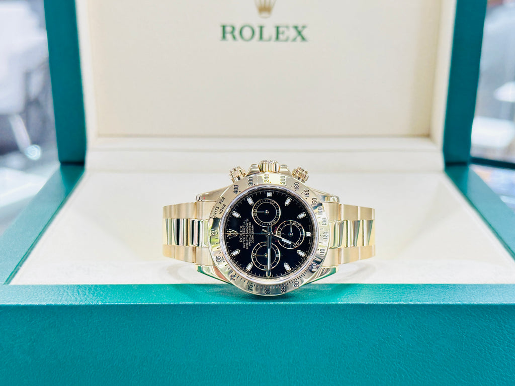 Rolex Daytona 116528 Black Dial Yellow Gold PreOwned Box - Diamonds East Intl.