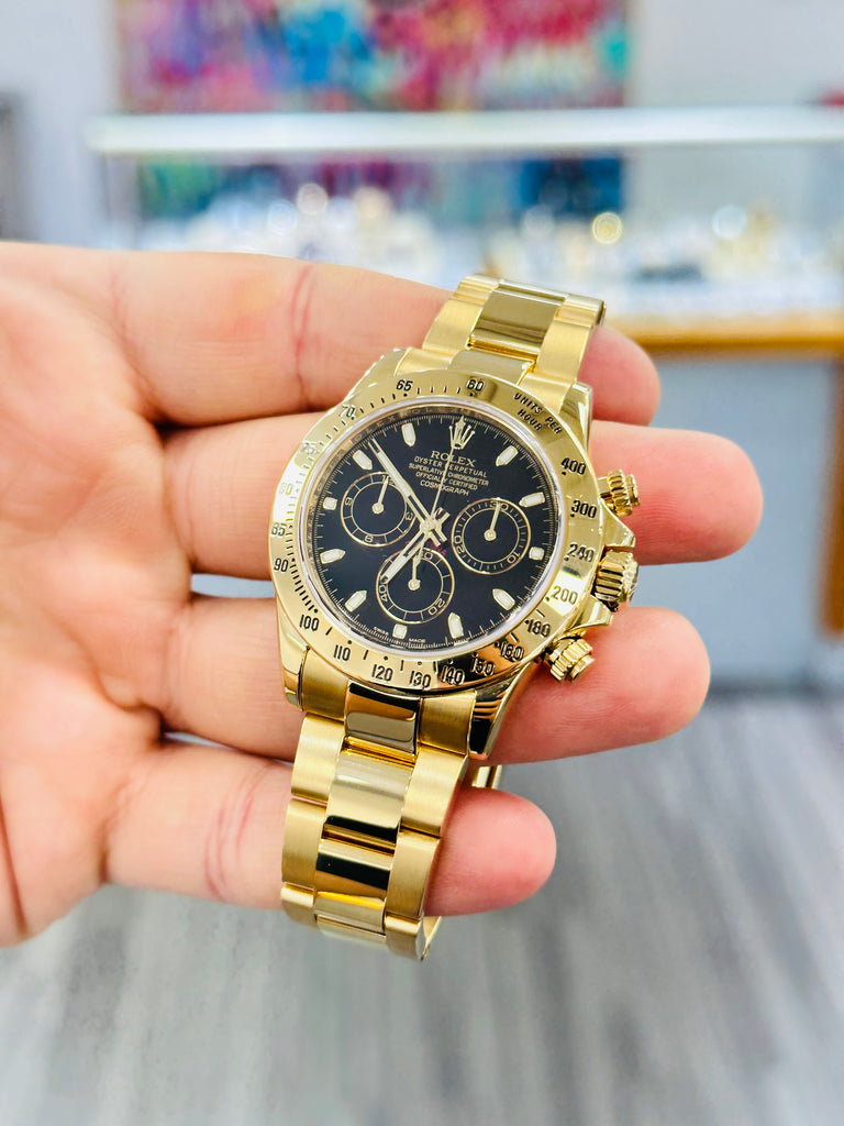 Rolex Daytona 116528 Black Dial Yellow Gold PreOwned Box - Diamonds East Intl.