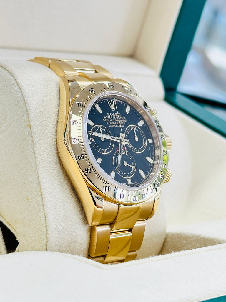 Rolex Daytona 116528 Black Dial Yellow Gold PreOwned Box - Diamonds East Intl.