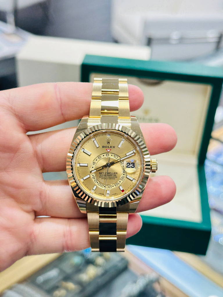 Rolex Sky-Dweller 326938 Yellow Gold Champagne Dial 42 Unworn Box and Papers - Diamonds East Intl.