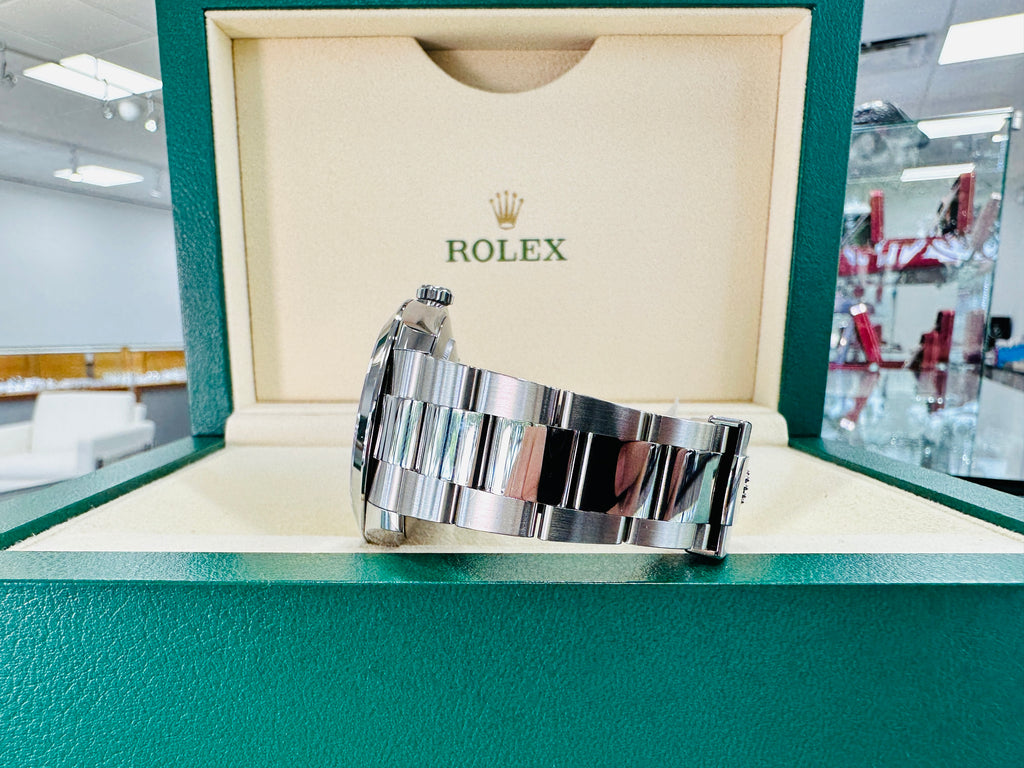 Rolex Datejust 41mm 126300 Blue Stick Dial Smooth Bezel Box  and Papers Unworn - Diamonds East Intl.