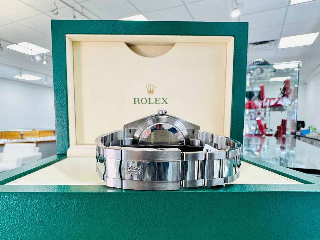 Rolex Datejust 41mm 126300 Blue Stick Dial Smooth Bezel Box  and Papers Unworn - Diamonds East Intl.