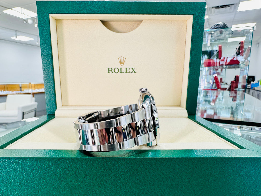 Rolex Datejust 41mm 126300 Blue Stick Dial Smooth Bezel Box  and Papers Unworn - Diamonds East Intl.