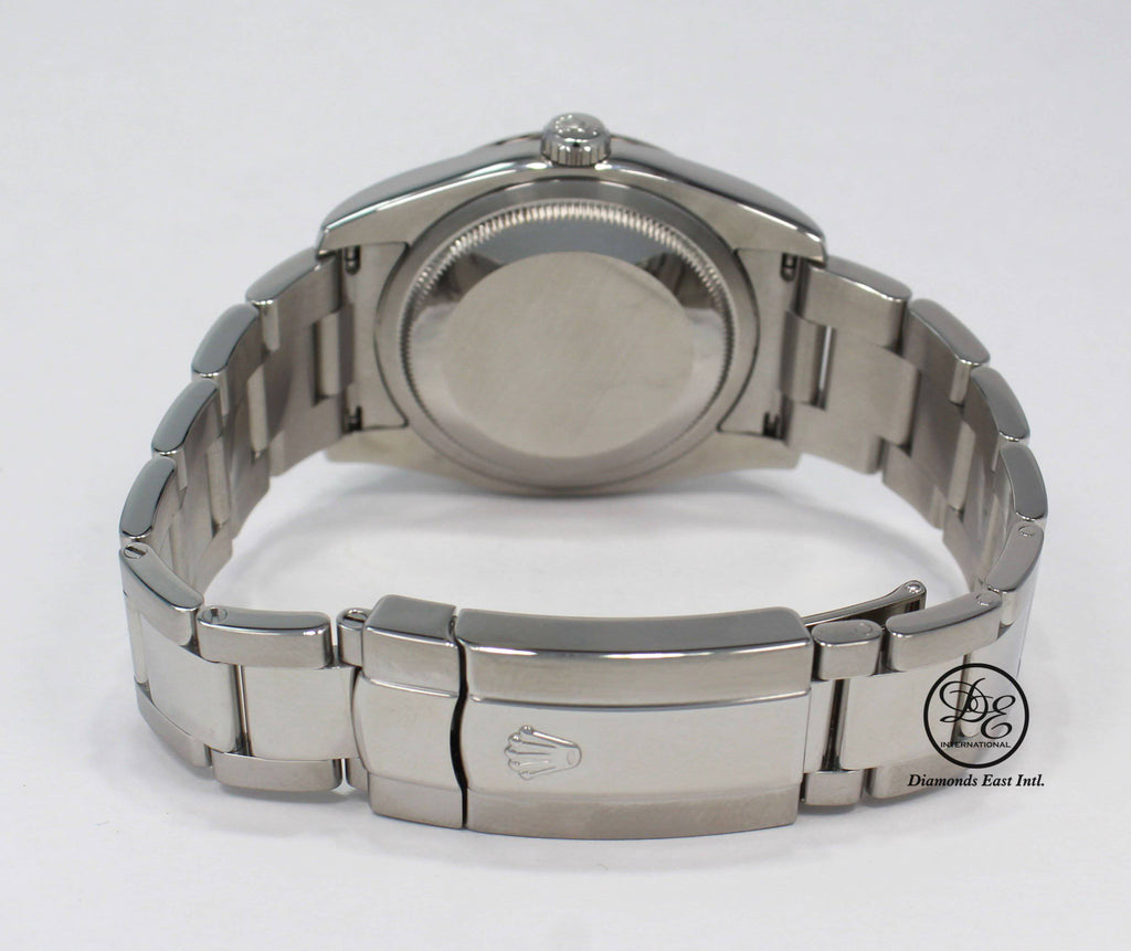 Rolex Datejust 116264 Turn-O-Graph Blue Dial 18K White Gold Bezel - Diamonds East Intl.