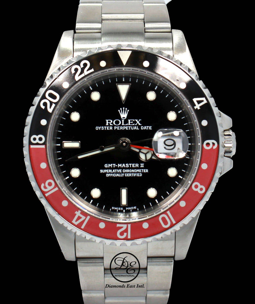 Rolex GMT MASTER II COKE 16710 BLACK/RED 40mm Steel Oyster Watch - Diamonds East Intl.