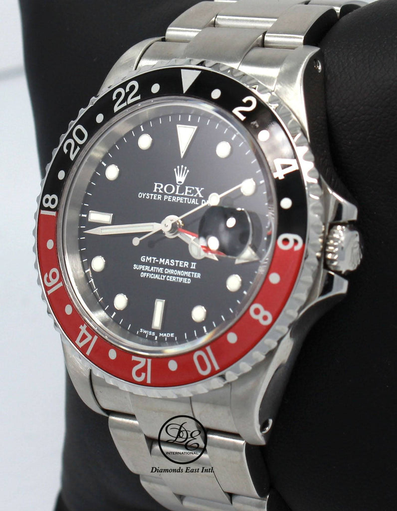 Rolex GMT MASTER II COKE 16710 BLACK/RED 40mm Steel Oyster Watch - Diamonds East Intl.