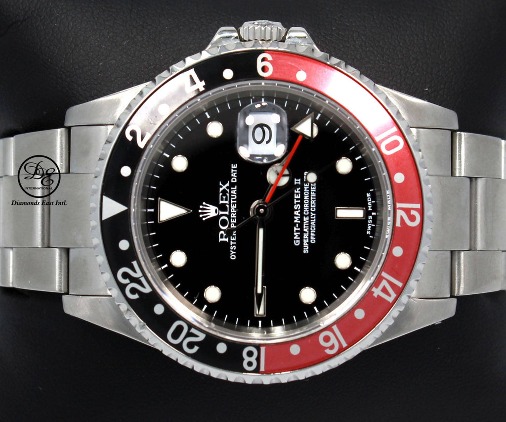 Rolex GMT MASTER II COKE 16710 BLACK/RED 40mm Steel Oyster Watch - Diamonds East Intl.