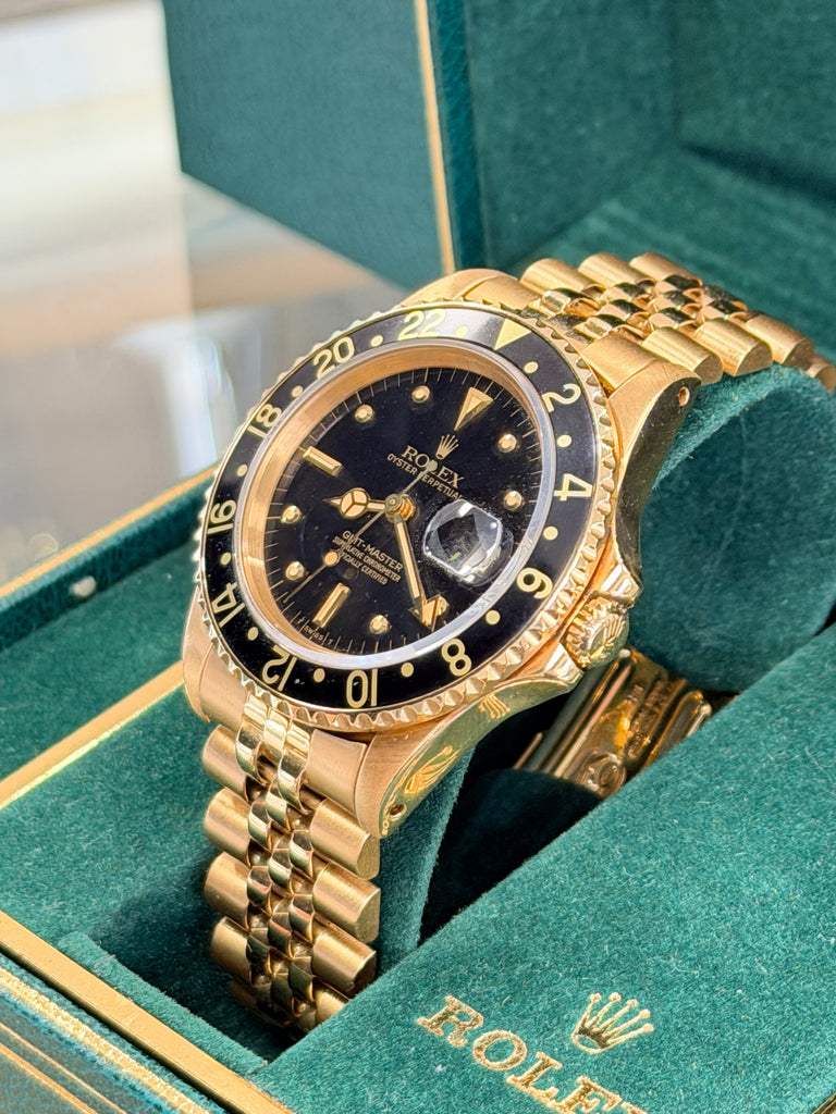 Rolex GMT-Master 40 16758 Black Dial Yellow Gold Box  PreOwned - Diamonds East Intl.
