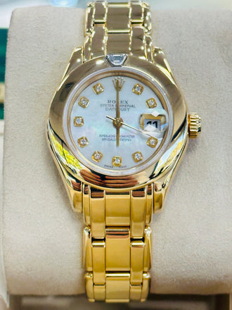 Rolex Lady-Datejust Pearlmaster 18K Yellow Gold 69328 Factory Mother Of Pearl Factory Trapezoid Diamond Bezel MINT