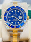 Rolex Submariner Date 116613LB “BLUESY” Factory Flat Blue Serti Diamond Dial Two-Tone Yellow Gold & Steel 40 Box and Papers MINT