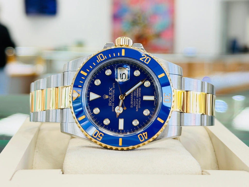 Rolex Submariner Date 116613LB “BLUESY” Factory Flat Blue Serti Diamond Dial Two-Tone Yellow Gold & Steel 40 Box and Papers MINT