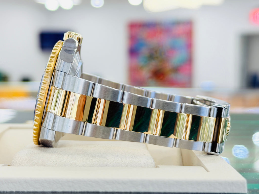 Rolex Submariner Date 116613LB “BLUESY” Factory Flat Blue Serti Diamond Dial Two-Tone Yellow Gold & Steel 40 Box and Papers MINT