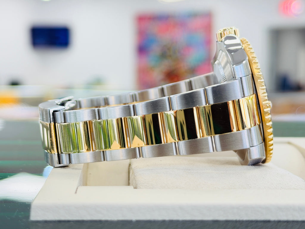 Rolex Submariner Date 116613LB “BLUESY” Factory Flat Blue Serti Diamond Dial Two-Tone Yellow Gold & Steel 40 Box and Papers MINT