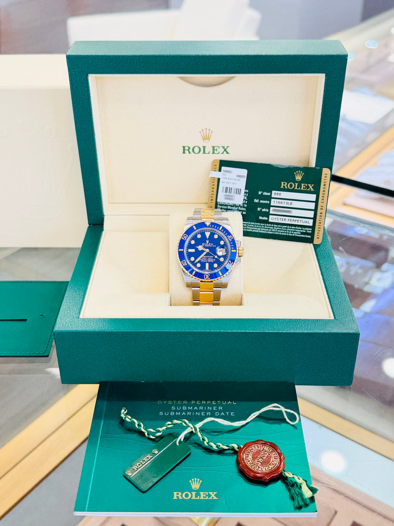 Rolex Submariner Date 116613LB “BLUESY” Factory Flat Blue Serti Diamond Dial Two-Tone Yellow Gold & Steel 40 Box and Papers MINT