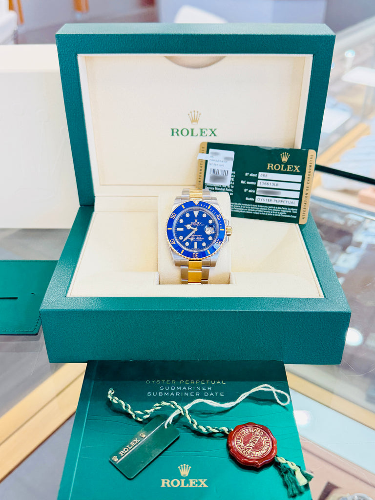 Rolex Submariner Date 116613LB “BLUESY” Factory Flat Blue Serti Diamond Dial Two-Tone Yellow Gold & Steel 40 Box and Papers MINT