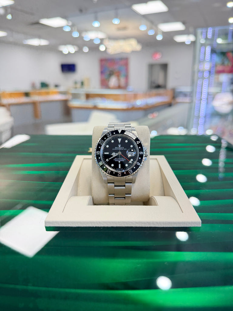 Rolex GMT-Master II 40 16710LN Black Dial “Red Arrow”  Stainless Steel Oyster PreOwned  Y serial 2001-2002 - Diamonds East Intl.