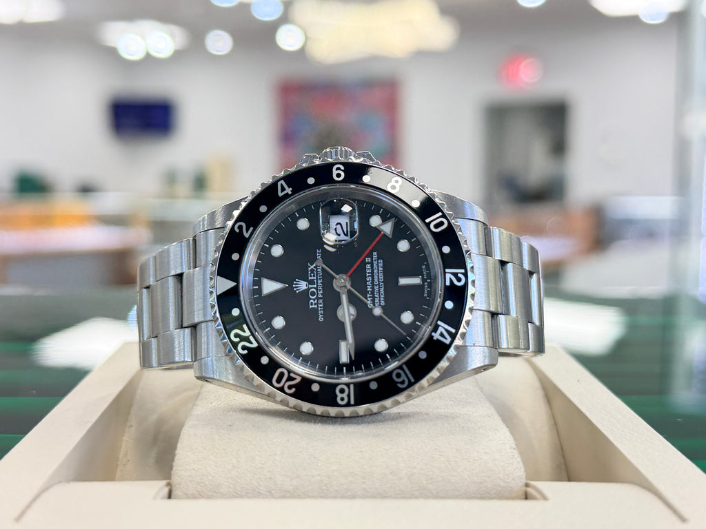 Rolex GMT-Master II 40 16710LN Black Dial “Red Arrow”  Stainless Steel Oyster PreOwned  Y serial 2001-2002 - Diamonds East Intl.