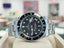 Rolex GMT-Master II 40 16710LN Black Dial “Red Arrow”  Stainless Steel Oyster PreOwned  Y serial 2001-2002 - Diamonds East Intl.