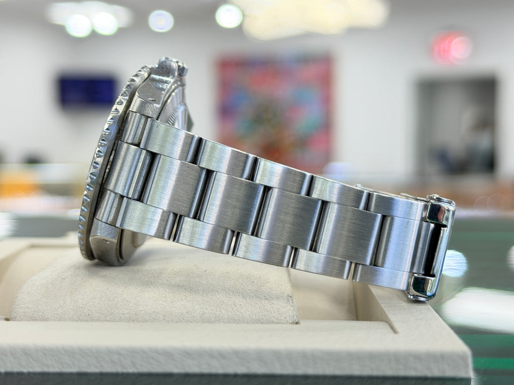 Rolex GMT-Master II 40 16710LN Black Dial “Red Arrow”  Stainless Steel Oyster PreOwned  Y serial 2001-2002 - Diamonds East Intl.