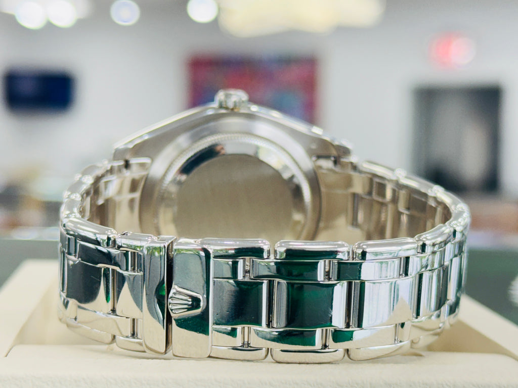 Rolex Day-Date 18956 39 Masterpiece with Factory baguette bezel  Factory Diamond Black Tahitian Dial  Platinum bracelet MINT - Diamonds East Intl.