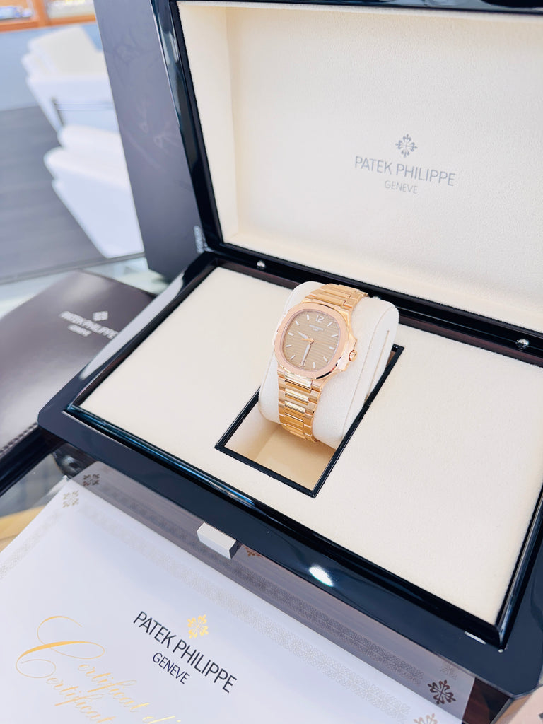 Patek Philippe Nautilus 7118/1R-010 18K Rose Gold Gold Opaline Dial Box and Papers Unworn 2024