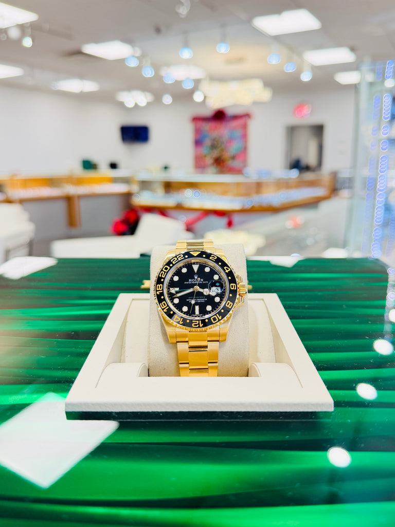 Rolex GMT-Master II 116718LN 40 BLACK Ceramic 18K Yellow Gold Oyster  BOX and Papers PreOwned - Diamonds East Intl.