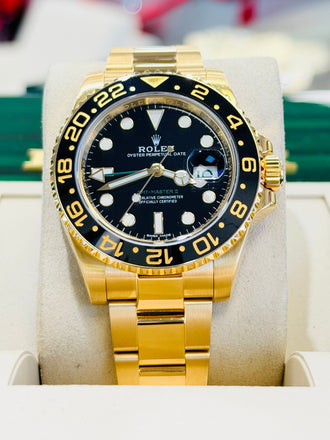 Rolex GMT-Master II 116718LN 40 BLACK Ceramic 18K Yellow Gold Oyster  BOX and Papers PreOwned - Diamonds East Intl.