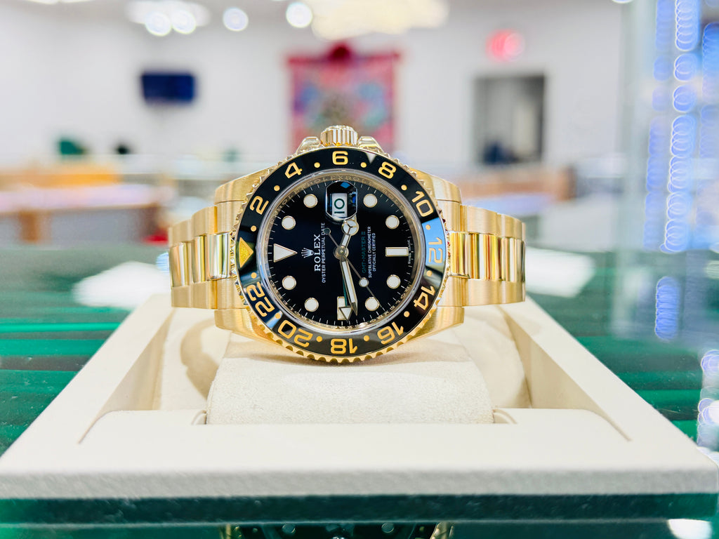 Rolex GMT-Master II 116718LN 40 BLACK Ceramic 18K Yellow Gold Oyster  BOX and Papers PreOwned - Diamonds East Intl.