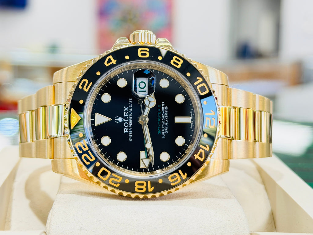 Rolex GMT-Master II 116718LN 40 BLACK Ceramic 18K Yellow Gold Oyster  BOX and Papers PreOwned - Diamonds East Intl.