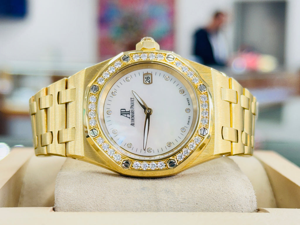 Audemars Piguet Royal Oak Lady 67601BA.ZZ.1210BA.02 Quartz Yellow Gold Factory Diamond Mother of Pearl MINT - Diamonds East Intl.