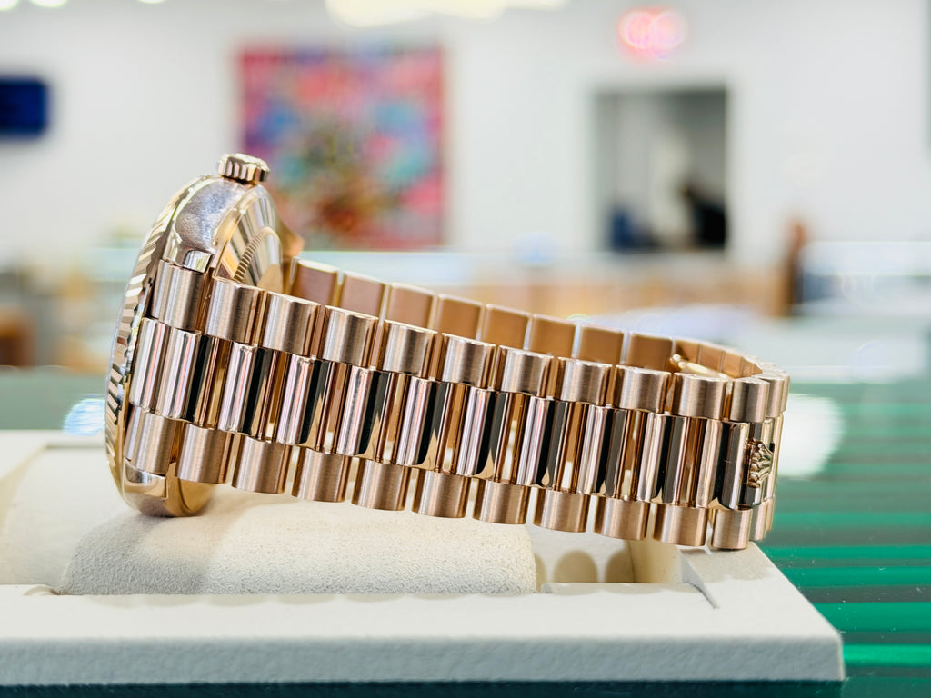 Rolex Day-Date 40 228235 Factory Sundust Baguette Diamond Dial Box and Papers PreOwned - Diamonds East Intl.