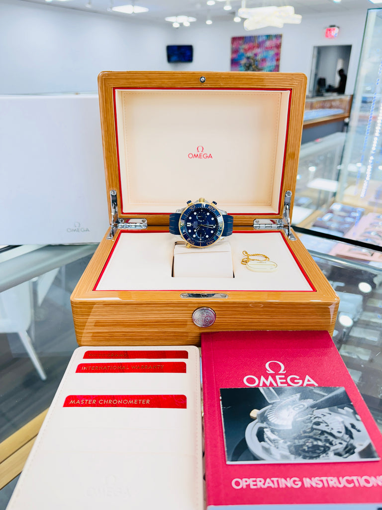 OMEGA Seamaster Diver 300M 18k Yellow Gold/SS Blue Dial 210.22.44.51.03.001 BOX/PAPERS MINT