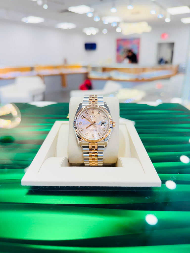 Rolex Datejust 36 116231  Factory Pink Diamond Jubilee Dial EverRose and Steel Jubilee  Band Box and Papers PreOwned - Diamonds East Intl.