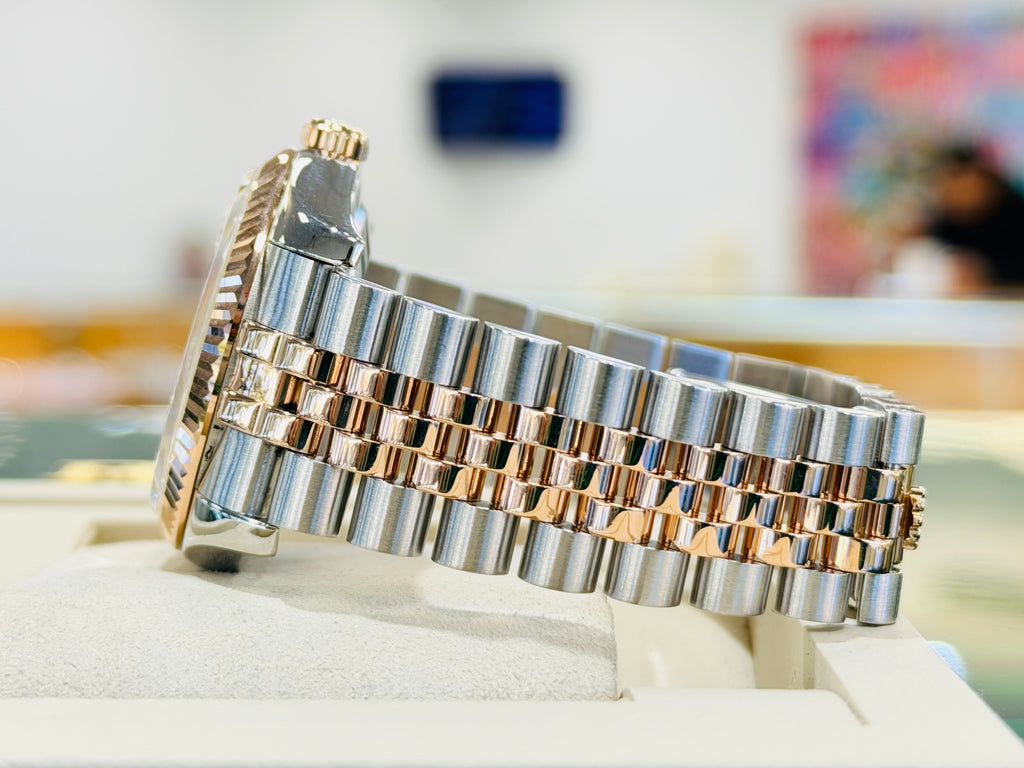 Rolex Datejust 36 116231  Factory Pink Diamond Jubilee Dial EverRose and Steel Jubilee  Band Box and Papers PreOwned - Diamonds East Intl.