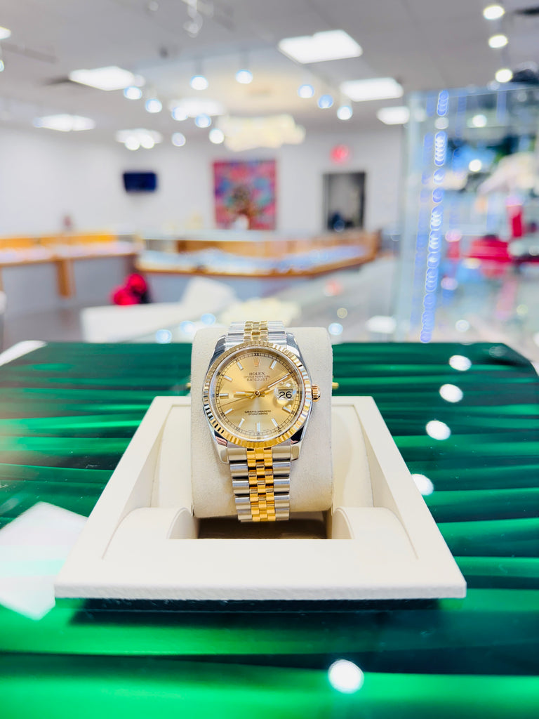 Rolex Datejust 36 116233 Fluted Bezel  Champagne Stick Dial super Jubilee Bracelet  PreOwned - Diamonds East Intl.
