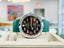 Rolex Air King 40 116900  Arabic Dial Stainless Steel Oyster PreOwned  Custom Rubber B Band Green - Diamonds East Intl.