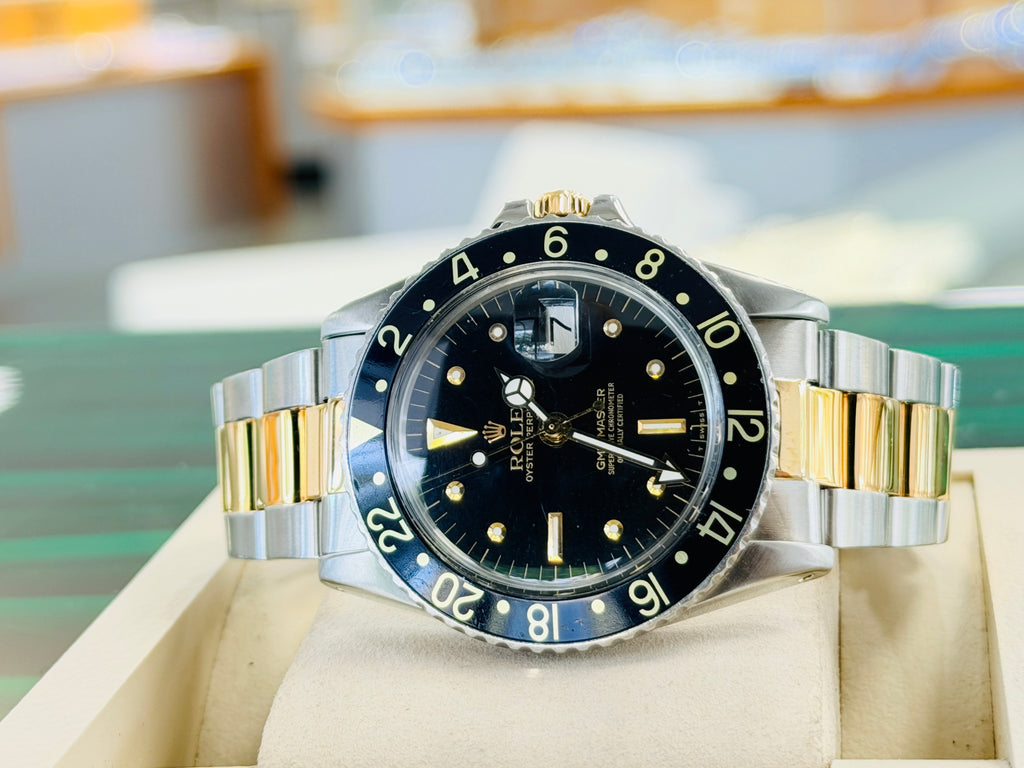 Rolex GMT-Master 40 1675  Stainless & Gold Oyster Black Dial  Vintage 5 Million Serial PreOwned - Diamonds East Intl.